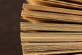 Stack of old book pages showing aged texture and knowledge Royalty Free Stock Photo
