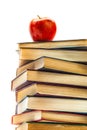 Stack of Old Books With an Apple on Top Royalty Free Stock Photo