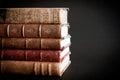 Stack of old books on black background Royalty Free Stock Photo