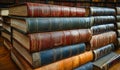 A stack of old books with a blue book on top Royalty Free Stock Photo