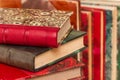 Stack of old books with colorful ancient bindings Royalty Free Stock Photo