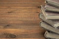 Stack Of Old Books With Copyspace On Wood Background
