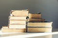 Stack of old books education retro concept background, many books piles with copy space for text Royalty Free Stock Photo