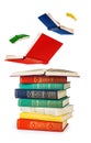 Stack of old books and flying books Royalty Free Stock Photo