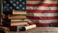 Stack of old books and rolled scroll sit on wooden surface with American flag background. Represents historical knowledge Royalty Free Stock Photo