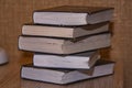 Stack of old books on the table side view Royalty Free Stock Photo