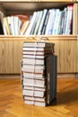 Stack of old books tied with rope on parquet floor Royalty Free Stock Photo
