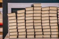 Stack of old books bears cultural and devotional meaning. Pile of volumes in a church conveys instruction and education concept