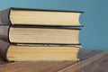 A stack of old books with yellow pages. Book binding. Knowledge and education Royalty Free Stock Photo