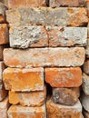 Stack of old broken red clay brick from construction waste Royalty Free Stock Photo