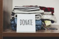 Stack of old clothes to discard declutter or donate. Recycling fabric cotton Royalty Free Stock Photo