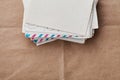 Stack of old envelopes and letters on kraft paper, top view Royalty Free Stock Photo