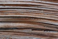 Stack of old fiberboards, edges of used hdf panels as background