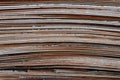 Stack of old fiberboards, edges of used hdf panels as background