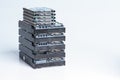 Stack of old hard drives on white background Royalty Free Stock Photo