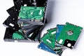 Stack of old hard drives on white background Royalty Free Stock Photo