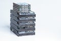 Stack of old hard drives on white background Royalty Free Stock Photo
