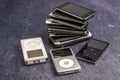 Stack of old iPhones and iPods