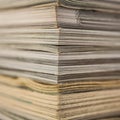 Stack of old magazines macro Royalty Free Stock Photo