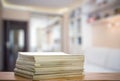 Stack of old magazines on wooden table Royalty Free Stock Photo