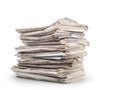 A stack of old newspapers isolated on white Royalty Free Stock Photo