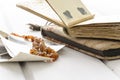 Stack of old photographs with amber necklace Royalty Free Stock Photo