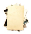 Stack old photos isolated on white background. Mock-up blank paper. Postcard rumpled and dirty vintage Royalty Free Stock Photo