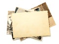 Stack old photos isolated on white background. Mock-up blank paper. Postcard rumpled and dirty vintage Royalty Free Stock Photo