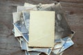 Stack old photos on table. Mock-up blank paper. Postcard rumpled and dirty vintage Royalty Free Stock Photo