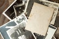 Stack old photos on table. Mock-up blank paper. Postcard rumpled and dirty vintage Royalty Free Stock Photo