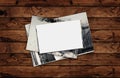 Stack old retro foto and postcard frame stack on wooden table Royalty Free Stock Photo