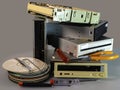 Stack of old SATA, ATA hard disk drives and driver cd disassembled Royalty Free Stock Photo