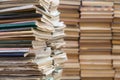 A stack of old school notebooks and a stack of textbooks or books Royalty Free Stock Photo