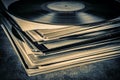 Stack of old vinyl records on the table. Retro style toned image Royalty Free Stock Photo
