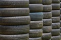 Stack of old wheel black tyres. Royalty Free Stock Photo