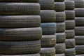 Stack of old wheel black tyres. Royalty Free Stock Photo