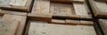 Stack of old wooden packaging boxes standing in column Royalty Free Stock Photo