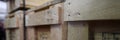 Stack of old wooden packaging boxes standing in column Royalty Free Stock Photo