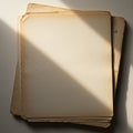 A stack of old, yellowed papers with creased and slightly torn edges, arranged on a Royalty Free Stock Photo