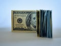 Stack of one hundred dollar bills new design on a white background - The President of USA is watching you with one eye Royalty Free Stock Photo