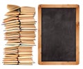 Stack of open books with school blackboard Royalty Free Stock Photo