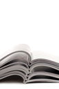 A stack of open magazines Royalty Free Stock Photo