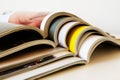 Stack of open printed magazines Royalty Free Stock Photo