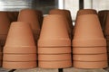 Stack of orange ceramic pottery bowls