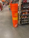 A stack of orange plastic busckets Home Depot home improvement store that have the company logo on them Royalty Free Stock Photo