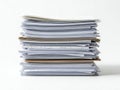 Stack of organized paperwork on desk Royalty Free Stock Photo