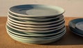 Stack of Pale Green-Blue Plates with Subtle White Rim Royalty Free Stock Photo