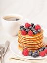 Stack of pancakes with berries breakfast