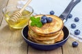 Stack of pancakes with blueberry and honey Royalty Free Stock Photo