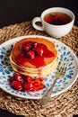 Stack of pancakes with dogberry jam Royalty Free Stock Photo